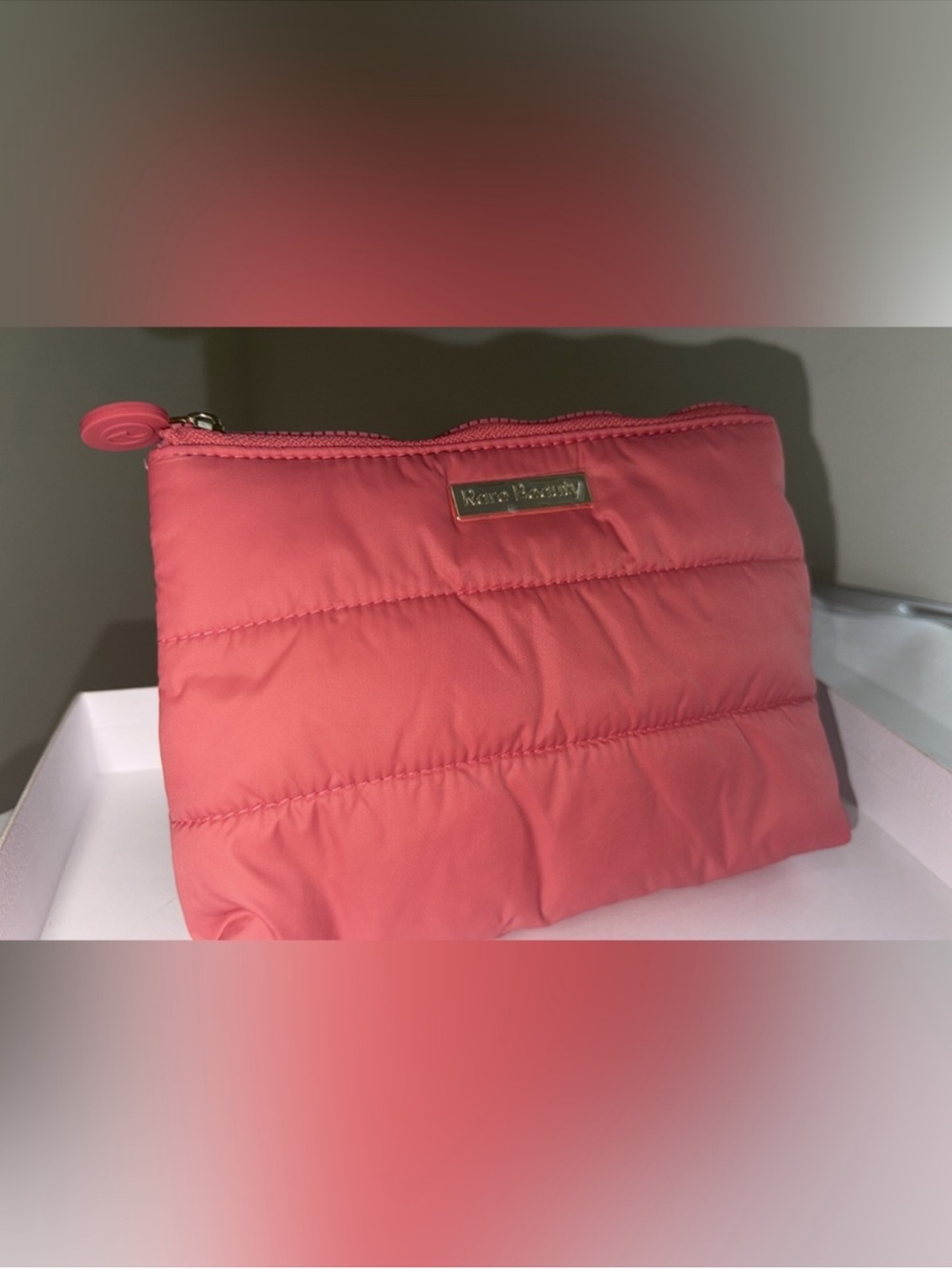 New,unused & authentic Rare Beauty Coral Pink Quilted Cosmetic Bag. Small size